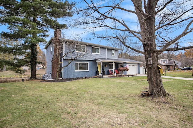 front of property featuring a garage and a front lawn