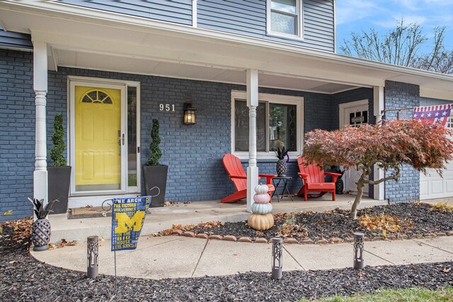 entrance to property with covered porch