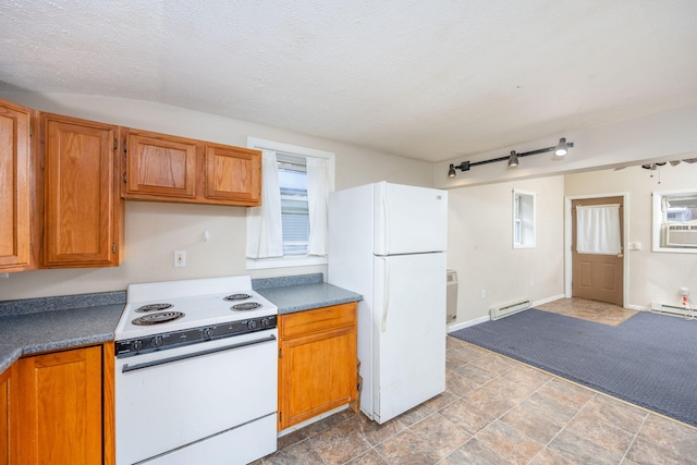 kitchen with white appliances, a textured ceiling, cooling unit, and a baseboard heating unit