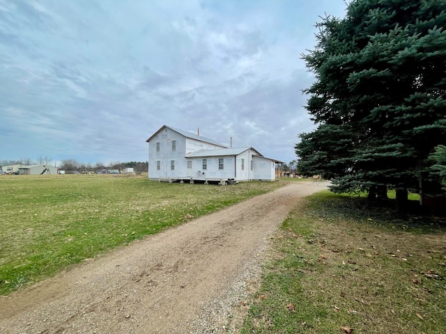 exterior space with a yard