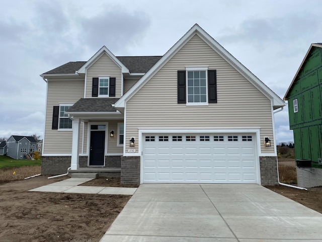 view of front of property featuring a garage