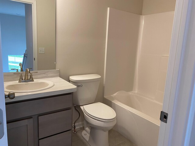 full bathroom featuring tile patterned flooring, vanity, toilet, and bathtub / shower combination