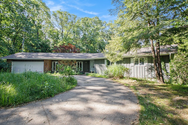 ranch-style home with a garage