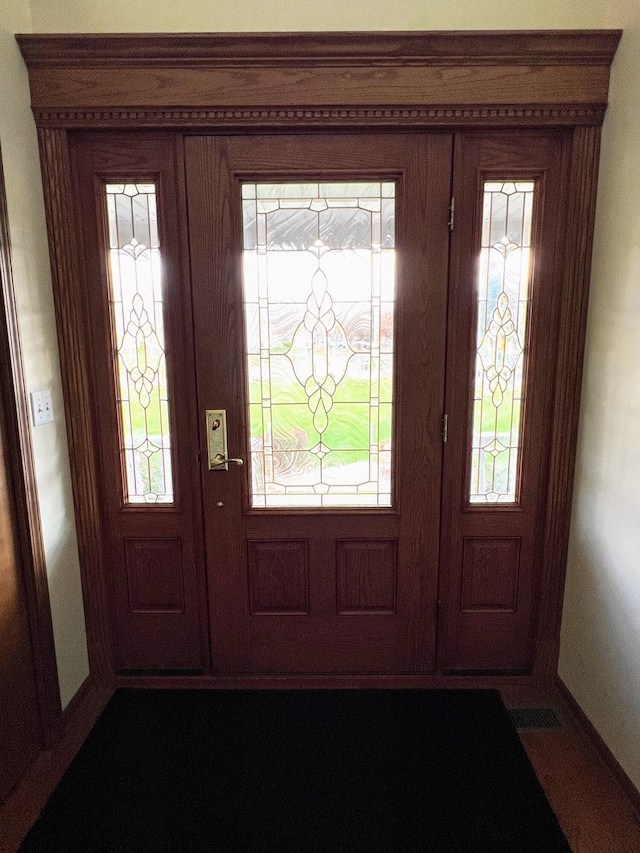 212 Saint Anne Ln, Monroe, MI 48162 - foyer entrance with baseboards and french doors