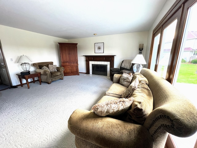 212 Saint Anne Ln, Monroe, MI 48162 - living room with light carpet, a fireplace, and baseboards