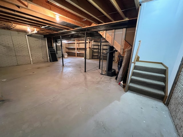 212 Saint Anne Ln, Monroe, MI 48162 - unfinished basement with stairs and water heater