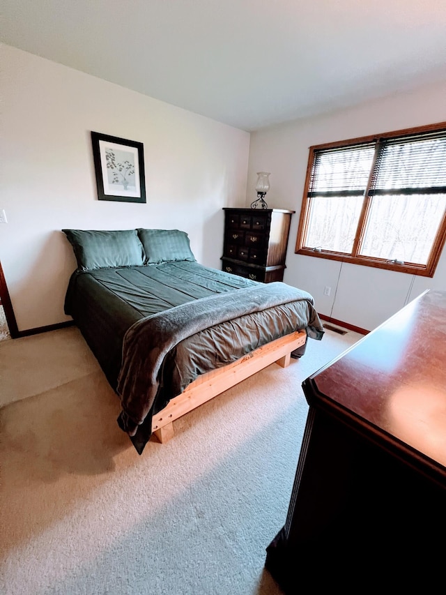212 Saint Anne Ln, Monroe, MI 48162 - bedroom with carpet floors and baseboards