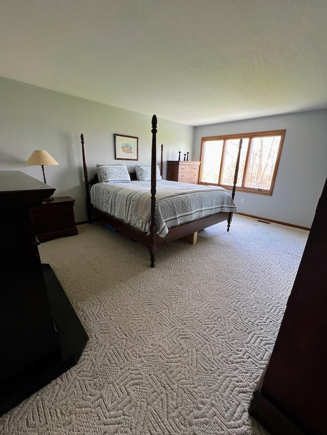 212 Saint Anne Ln, Monroe, MI 48162 - carpeted bedroom with baseboards