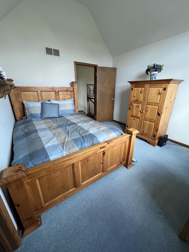212 Saint Anne Ln, Monroe, MI 48162 - bedroom with lofted ceiling, carpet flooring, and baseboards