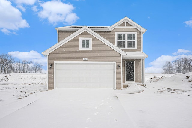 view of front of property featuring a garage