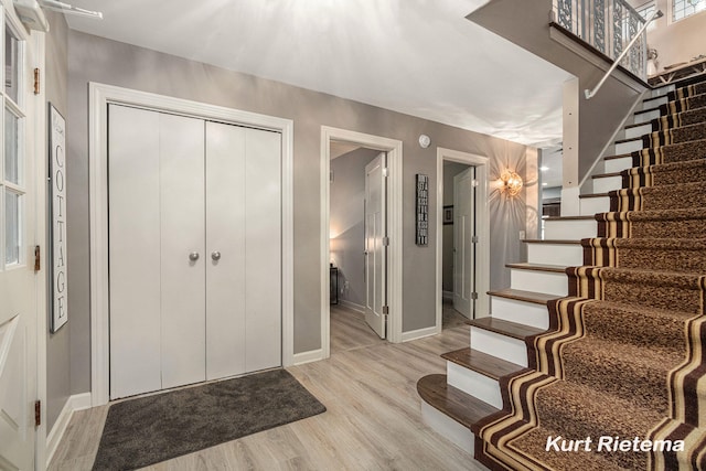 foyer with light hardwood / wood-style flooring