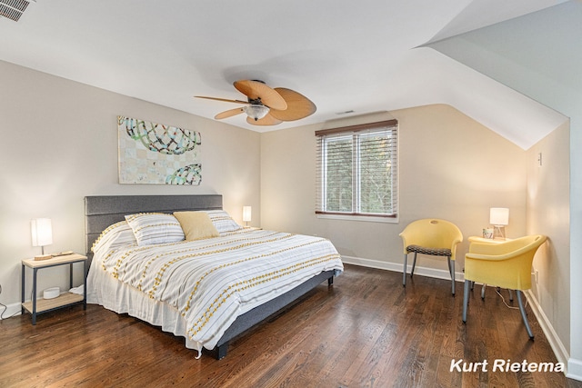 bedroom with dark hardwood / wood-style flooring, lofted ceiling, and ceiling fan