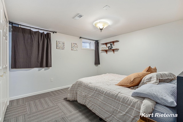 bedroom featuring carpet