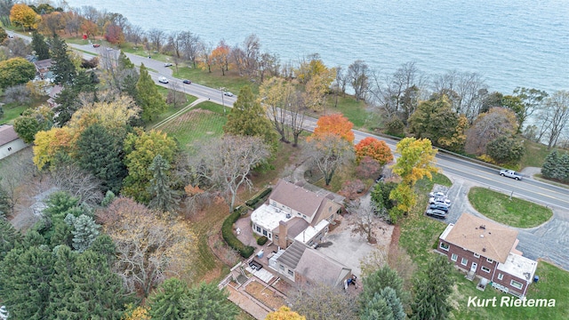 drone / aerial view with a water view