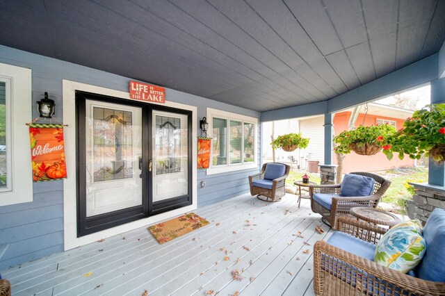 wooden deck featuring a porch