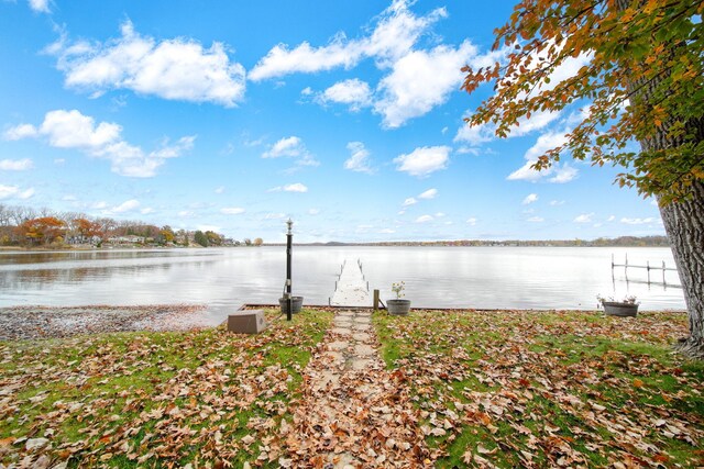 dock area featuring a water view