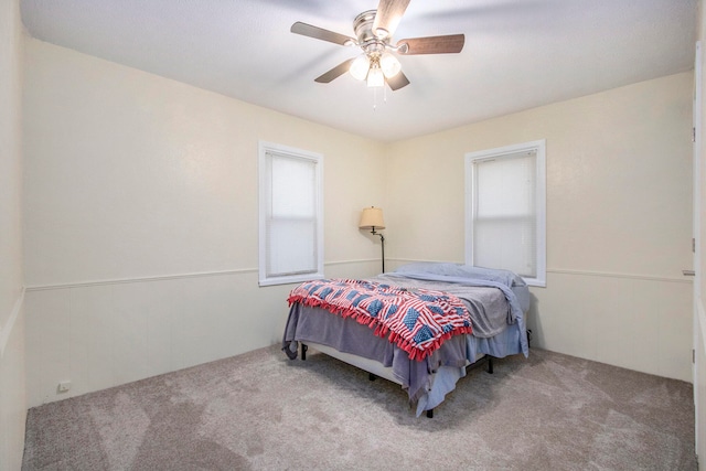 bedroom with carpet flooring and ceiling fan