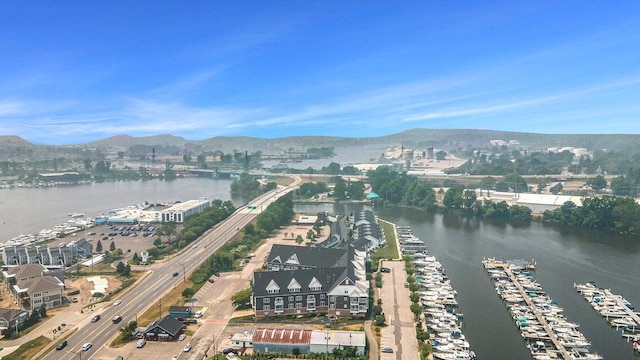 bird's eye view with a water and mountain view