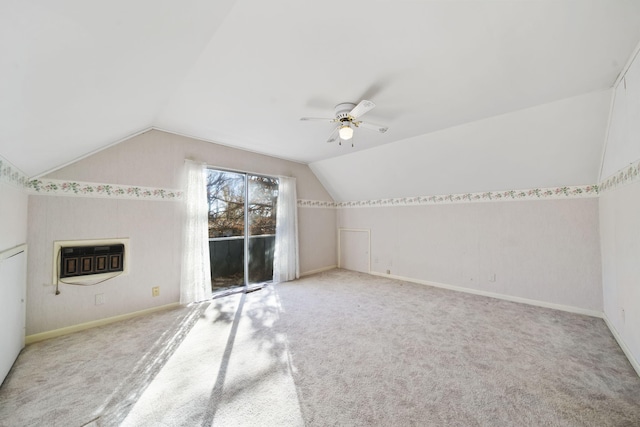 bonus room with carpet flooring, lofted ceiling, and ceiling fan