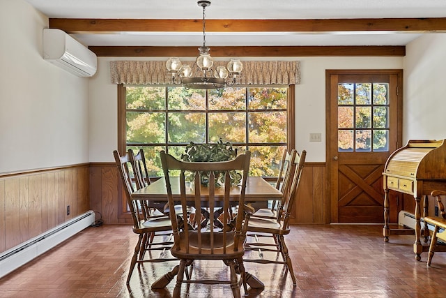 dining room featuring a wall mounted air conditioner, an inviting chandelier, baseboard heating, beamed ceiling, and wooden walls