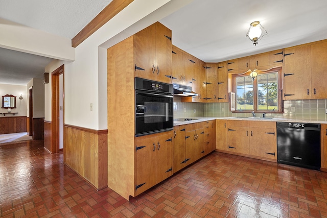 kitchen featuring black appliances, ceiling fan, sink, and tasteful backsplash