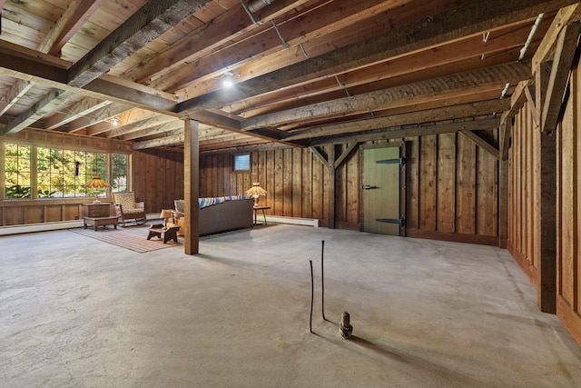 basement featuring a baseboard radiator