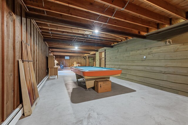 recreation room featuring wooden walls, billiards, and a baseboard heating unit