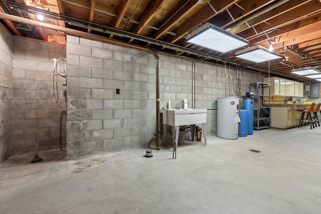 basement featuring electric water heater