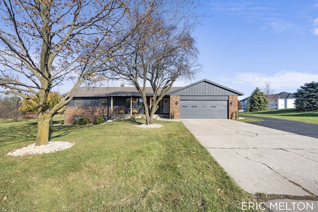 ranch-style home featuring a garage and a front lawn