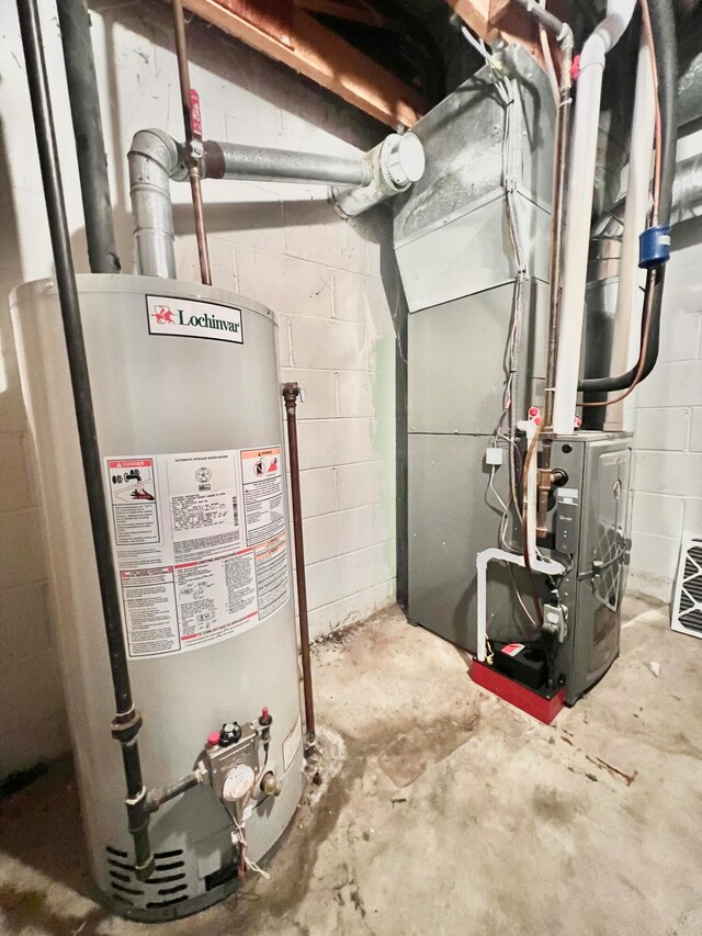 utility room with water heater