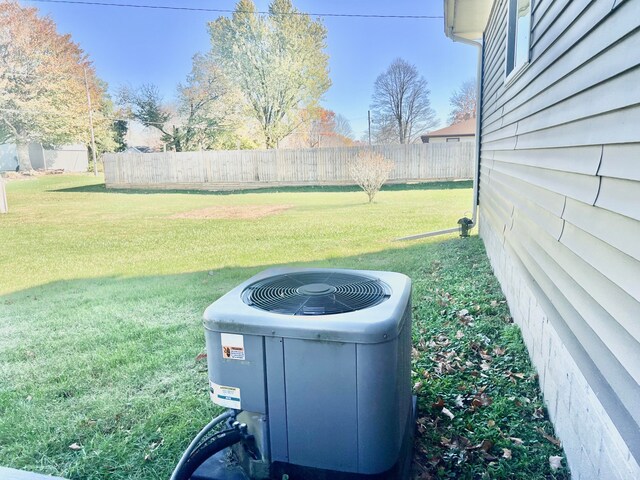 view of yard with central AC unit