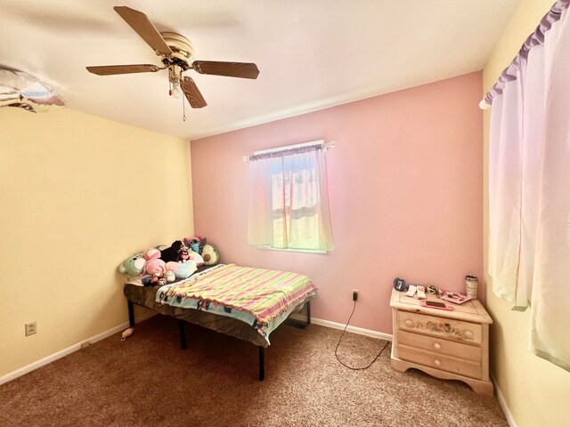 bedroom with ceiling fan and light colored carpet