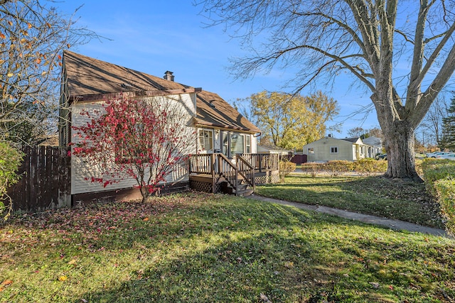 view of yard featuring a wooden deck