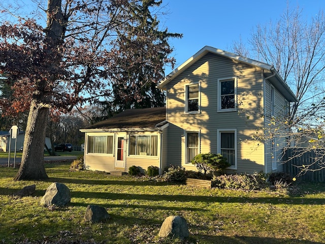 exterior space featuring a front yard