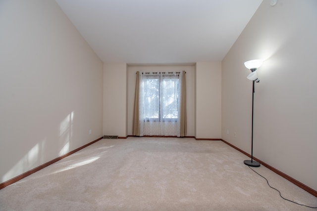 view of carpeted spare room