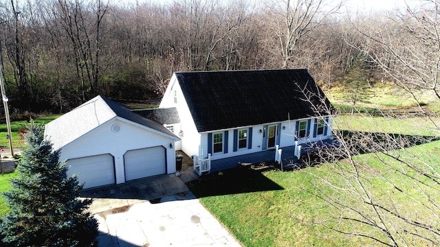 cape cod house with a garage