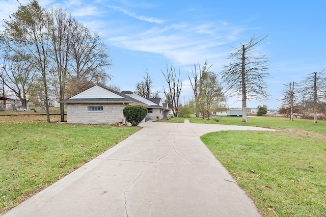 view of home's exterior with a yard