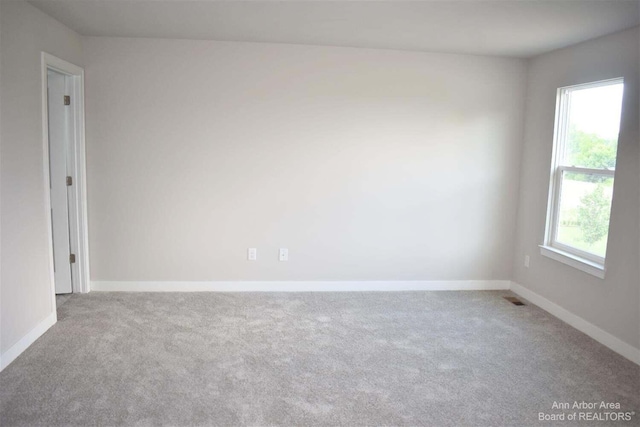 view of carpeted spare room