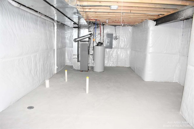 basement with electric panel, heating unit, and gas water heater