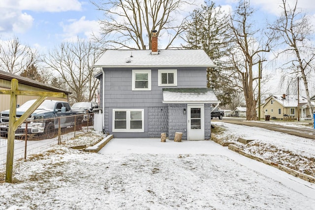 view of snow covered property