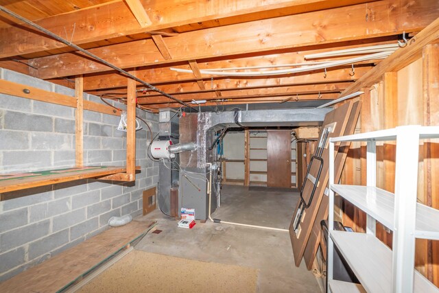 basement featuring heating unit