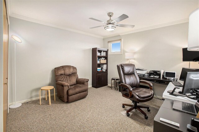 office area with ceiling fan, carpet flooring, and ornamental molding