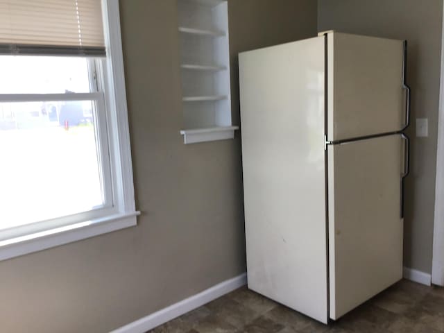 kitchen featuring white fridge