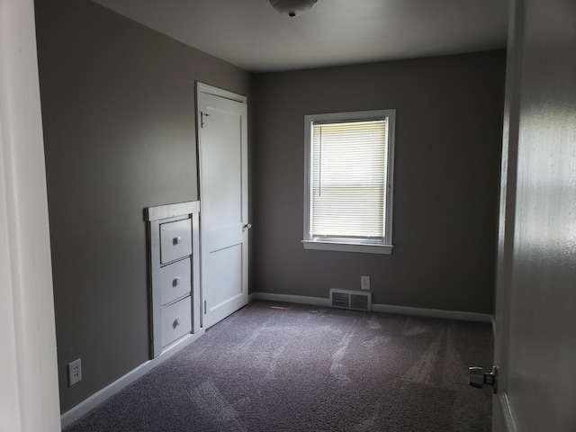 unfurnished bedroom featuring carpet floors