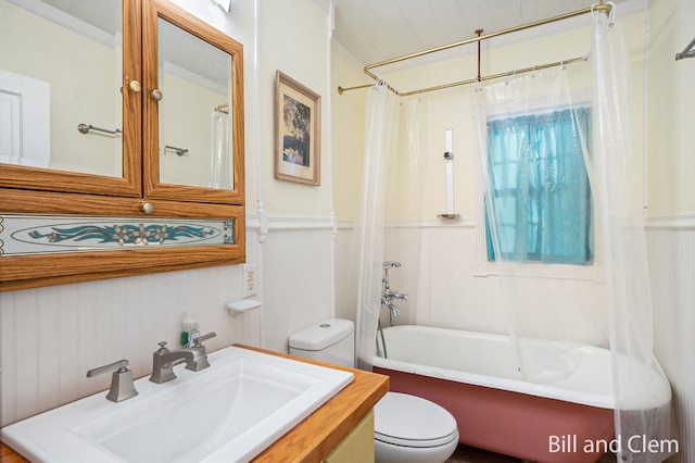 full bathroom with toilet, vanity, and shower / bath combination with curtain