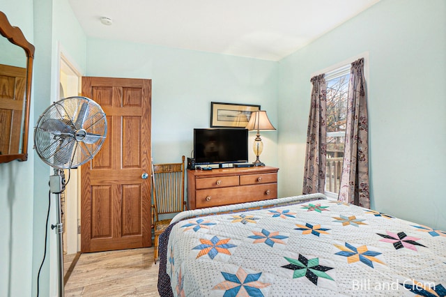 bedroom with light wood-type flooring