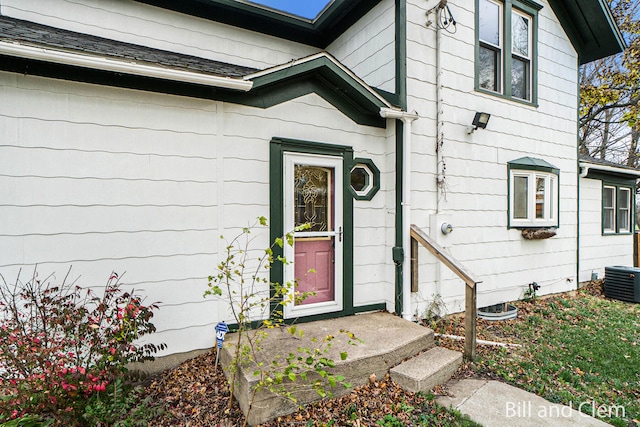 property entrance featuring central air condition unit