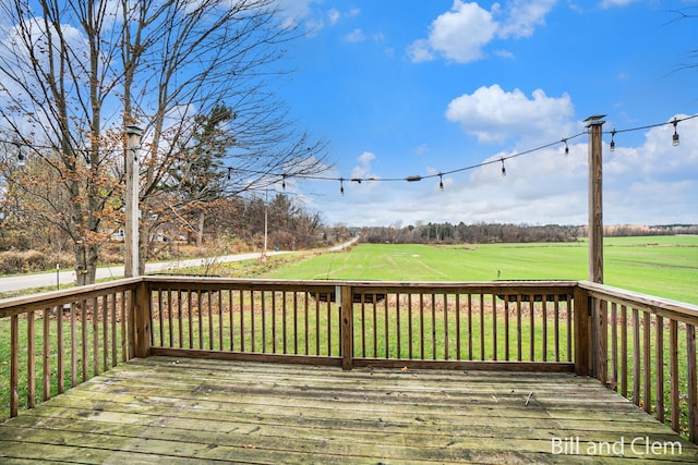 deck featuring a lawn