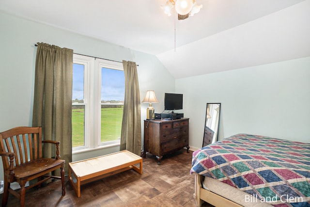 bedroom with ceiling fan and vaulted ceiling