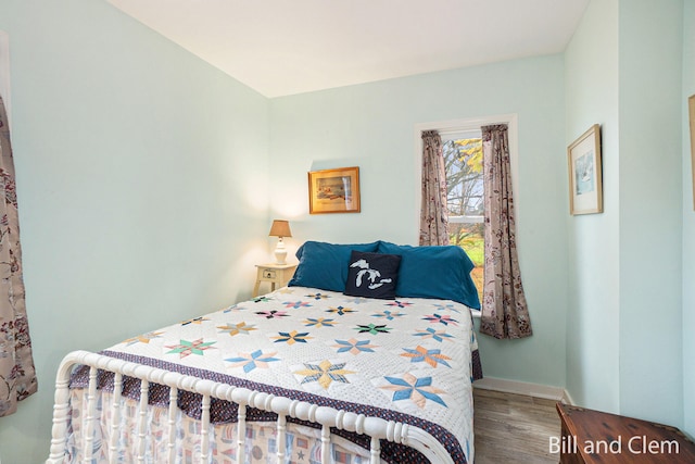 bedroom featuring hardwood / wood-style flooring